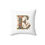 Thumbnail: Personalized Faux Suede White Throw Pillow with Illuminated Floral Alphabet E. Geoegie and Lexy Gifts and Home USA.