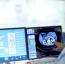 Doctor viewing CT scan