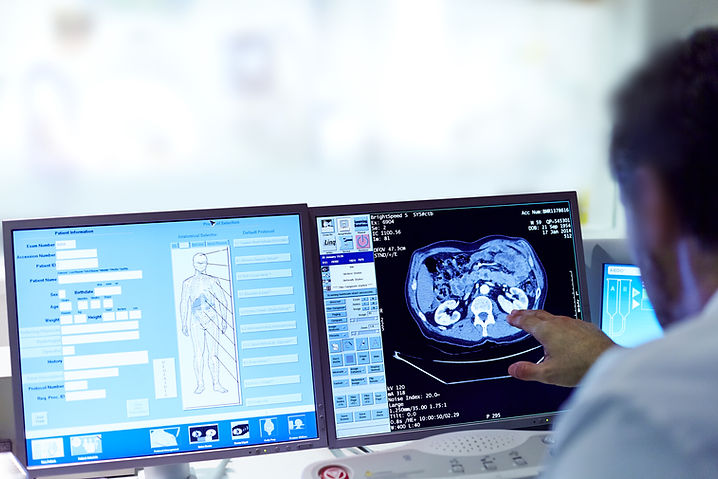 Doctor viewing CT scan