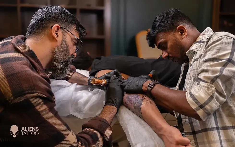 Tattoo artists working on Virat Kohli new tattoo sleeve at Aliens Tattoo