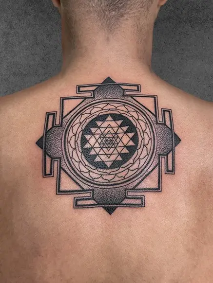 geometric tattoo on back