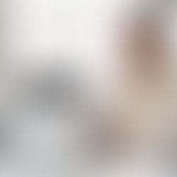 Happy smiling mature Latin business man using computer