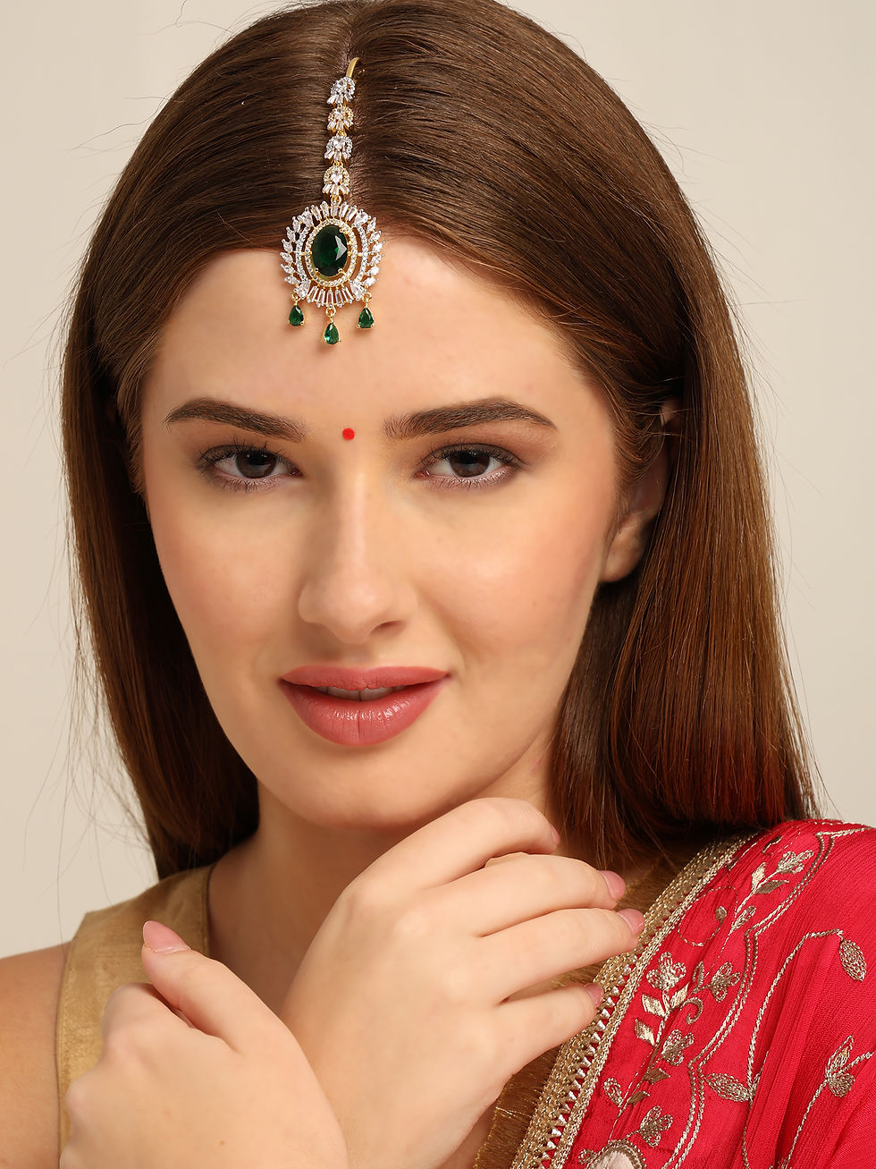 Gold and Silver Plated Oval Shaped AD Maangtikka