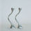 Thumbnail: 2 wavy silver candleholders intertwined