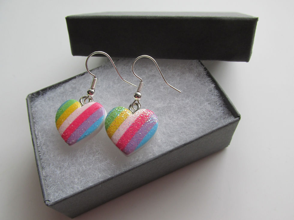 Thumbnail: Handmade Rainbow Heart NHS  Carer Pride Themed Earrings