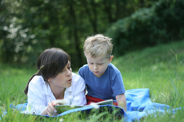 ReadingBookOutdoorsWeb.jpg