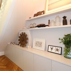 under stairs stoarge and shelving design by lost and found interiors