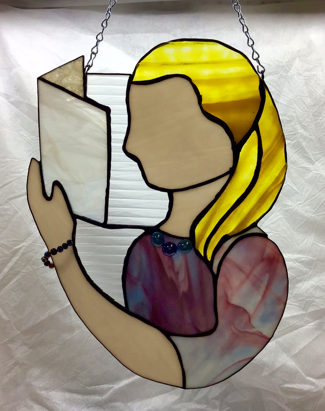 Stained glass book reader