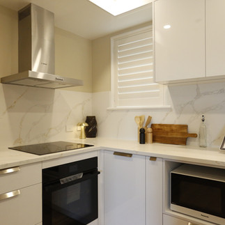 A beautiful white kitchen & cabinetry
