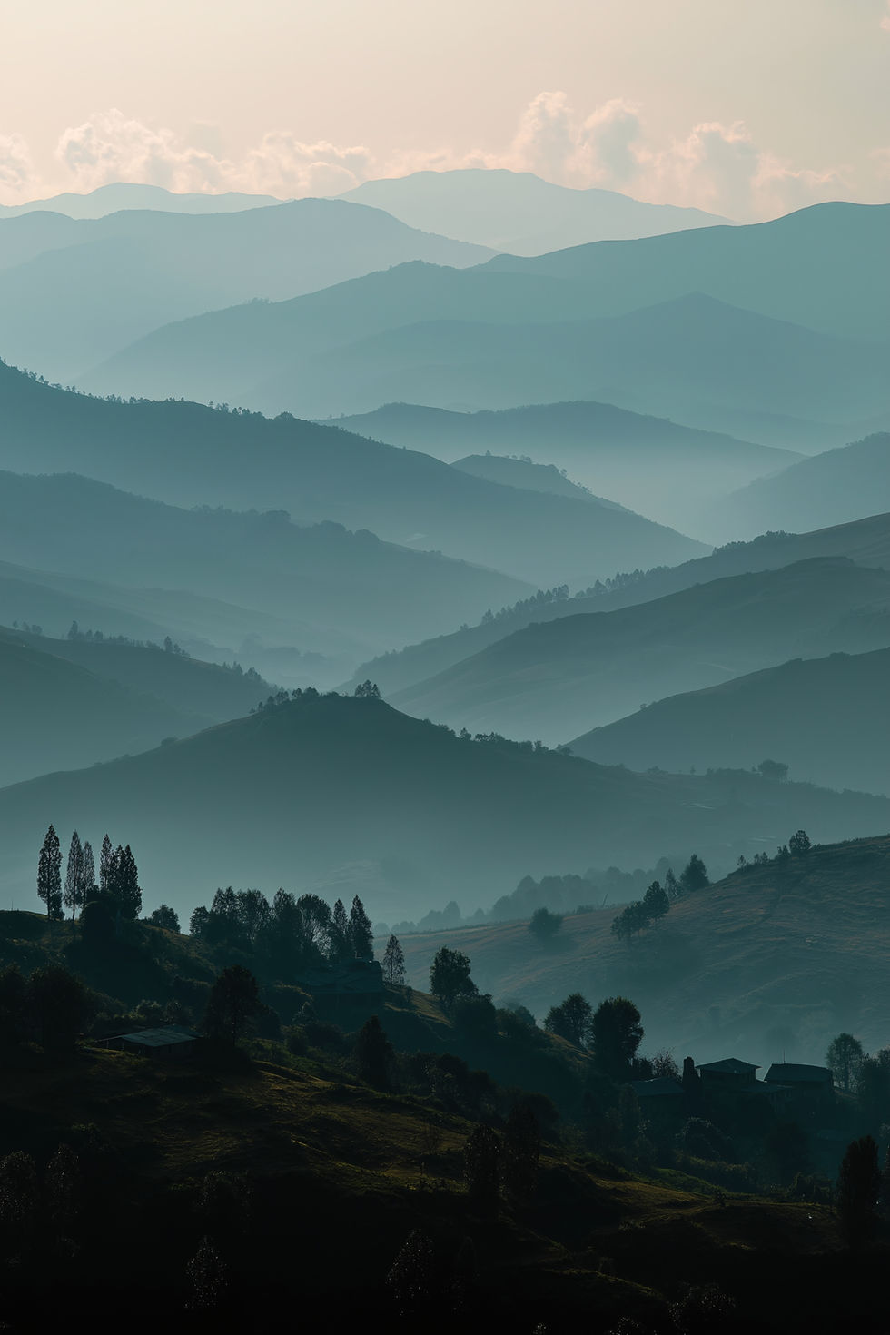 AI-generated image: Serene landscape with layers of mountains fading into a soft, misty, blue-hued atmosphere.