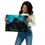 Thumbnail: a woman holding a large photograph of a gorilla in a natural, lush environment, realistic, photorealistic, detailed, studio lighting, professional photography