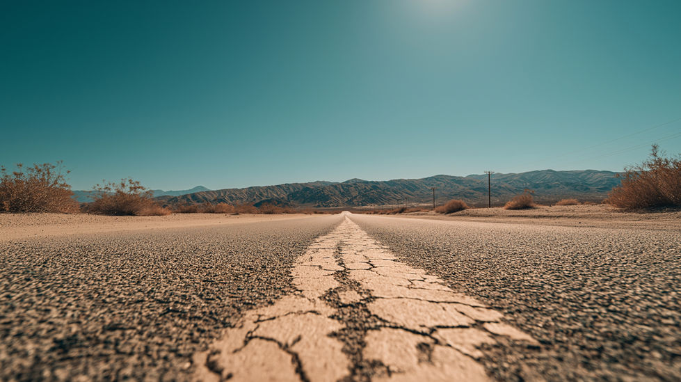 AI-generated image: Long road stretching into the distance with mountains on the horizon under a clear sky.