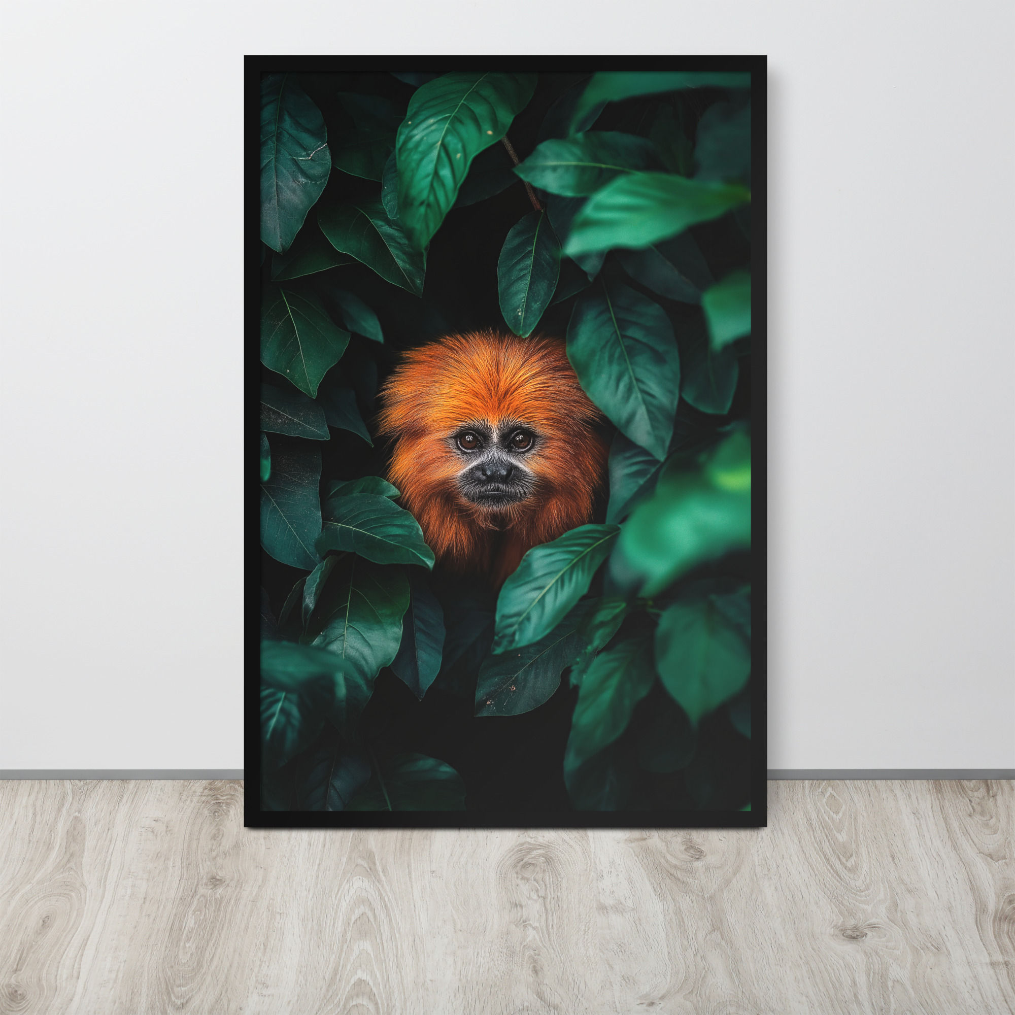 Golden Lion Tamarin peeking through lush green foliage