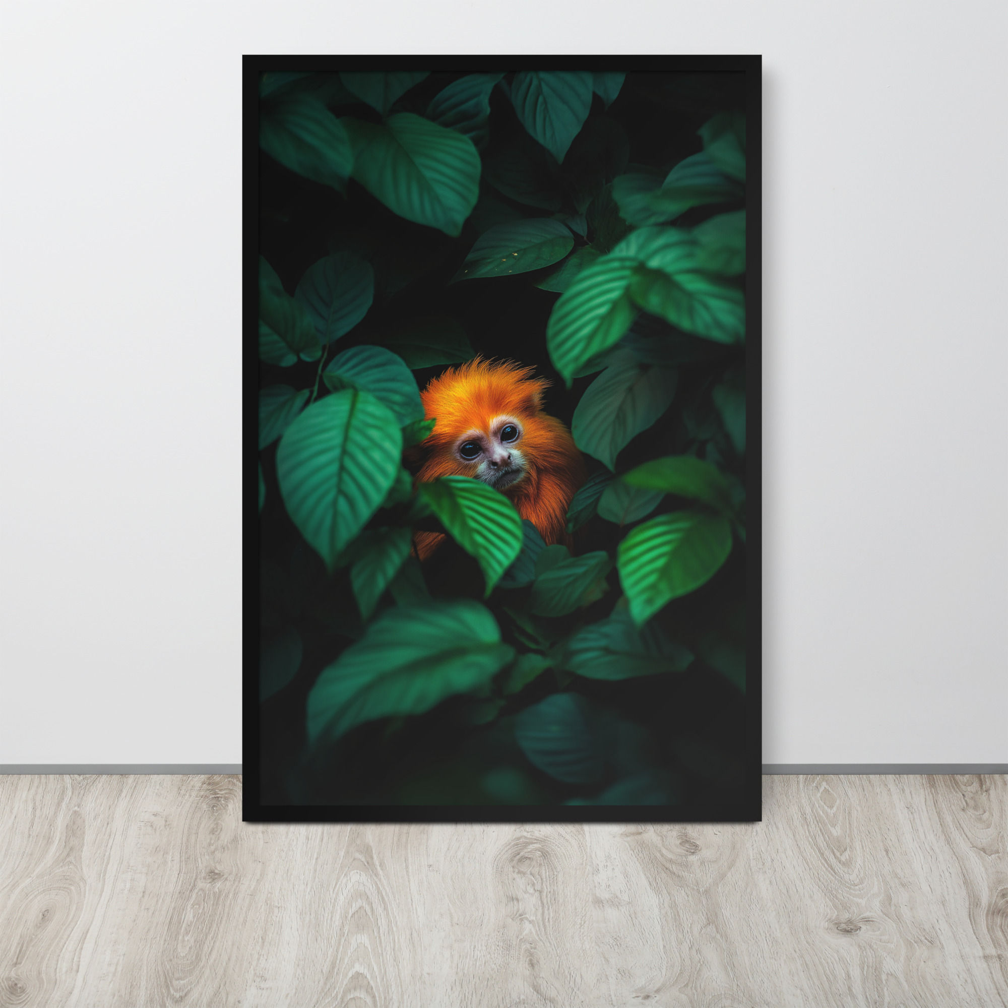 Golden Lion Tamarin peeking through leaves