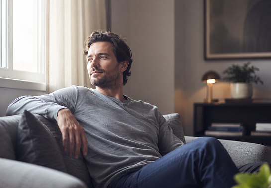 man looking away in room