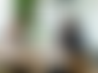 Malaysian corporate team reviewing 2026 ESG budget with sustainability reports and data analytics.