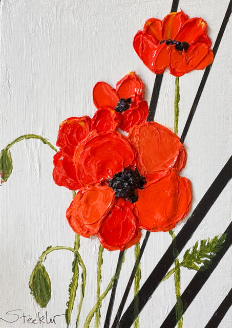 Orange poppies over a white and black background
