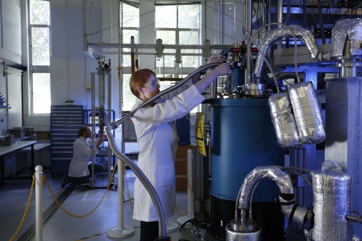 Lead author Dr Karina Hudson uses the UNSW lab dilution fridge, used to reach cryogenic temperatures