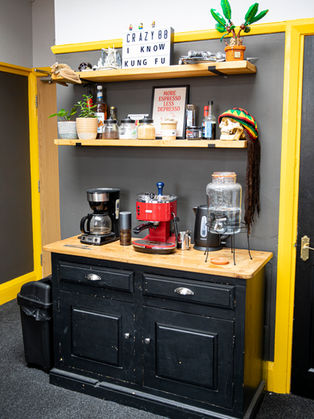 Water and coffee station in Crazy 88 Tattoo Studio, a wide range of complimentary refreshments and snacks are always on hand for customers getting tattooed.