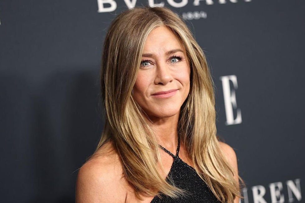 Holiday Love: Jennifer Aniston and Jim Curtis Share Heartwarming Moments Behind the Glamour