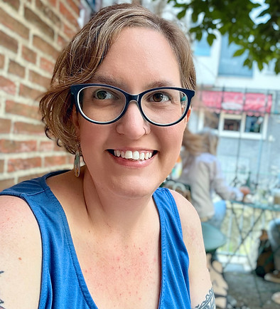 Picture of Ruth Montgomery, sitting outside and smiling.