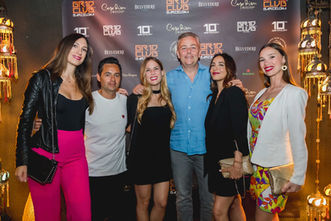 Mario Isola of Pirelli with Tara Ramos at the GR1D CLUB Barcelona