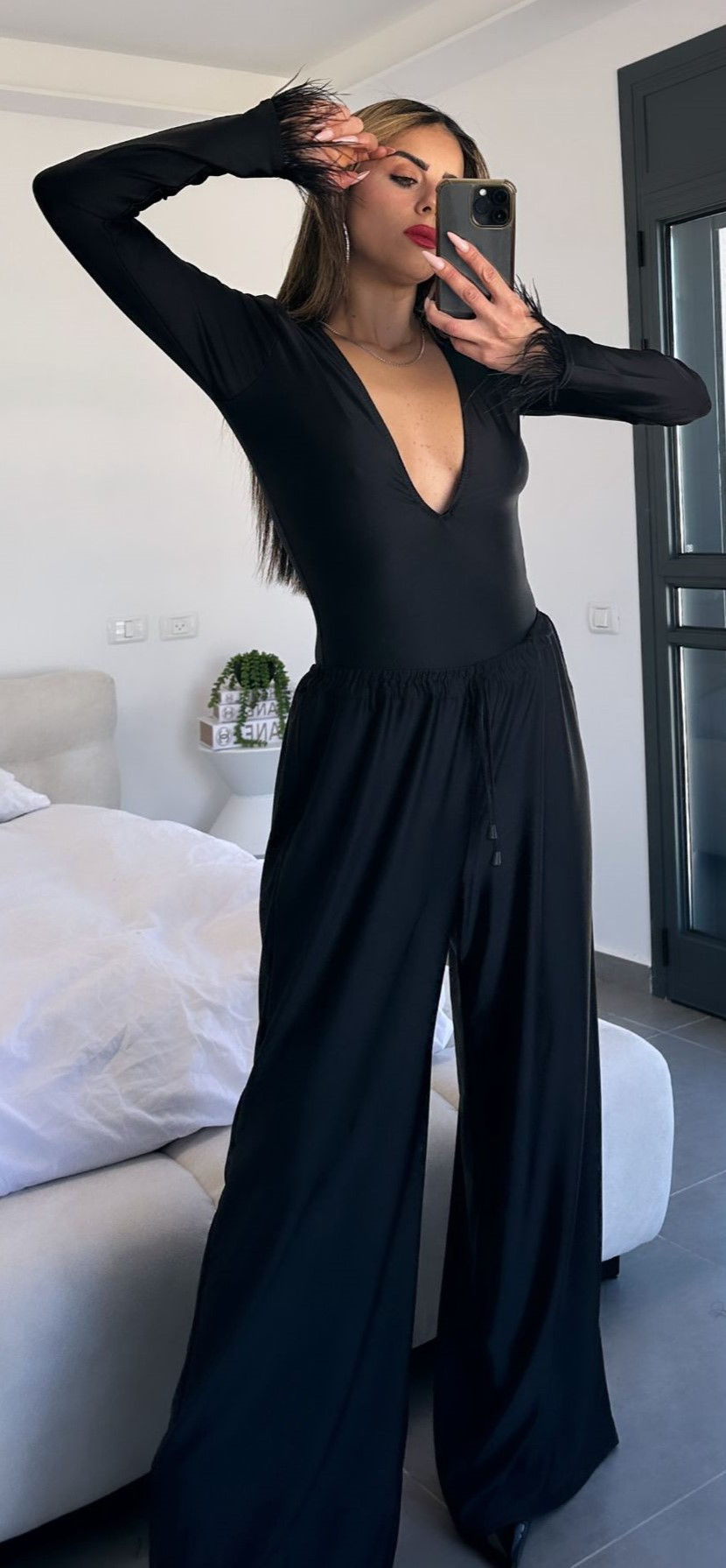 בגד גוף שחור לנשים