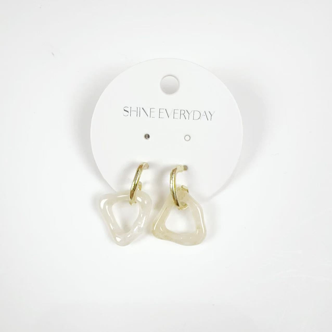 AC039クリアウェーブフープイヤリング