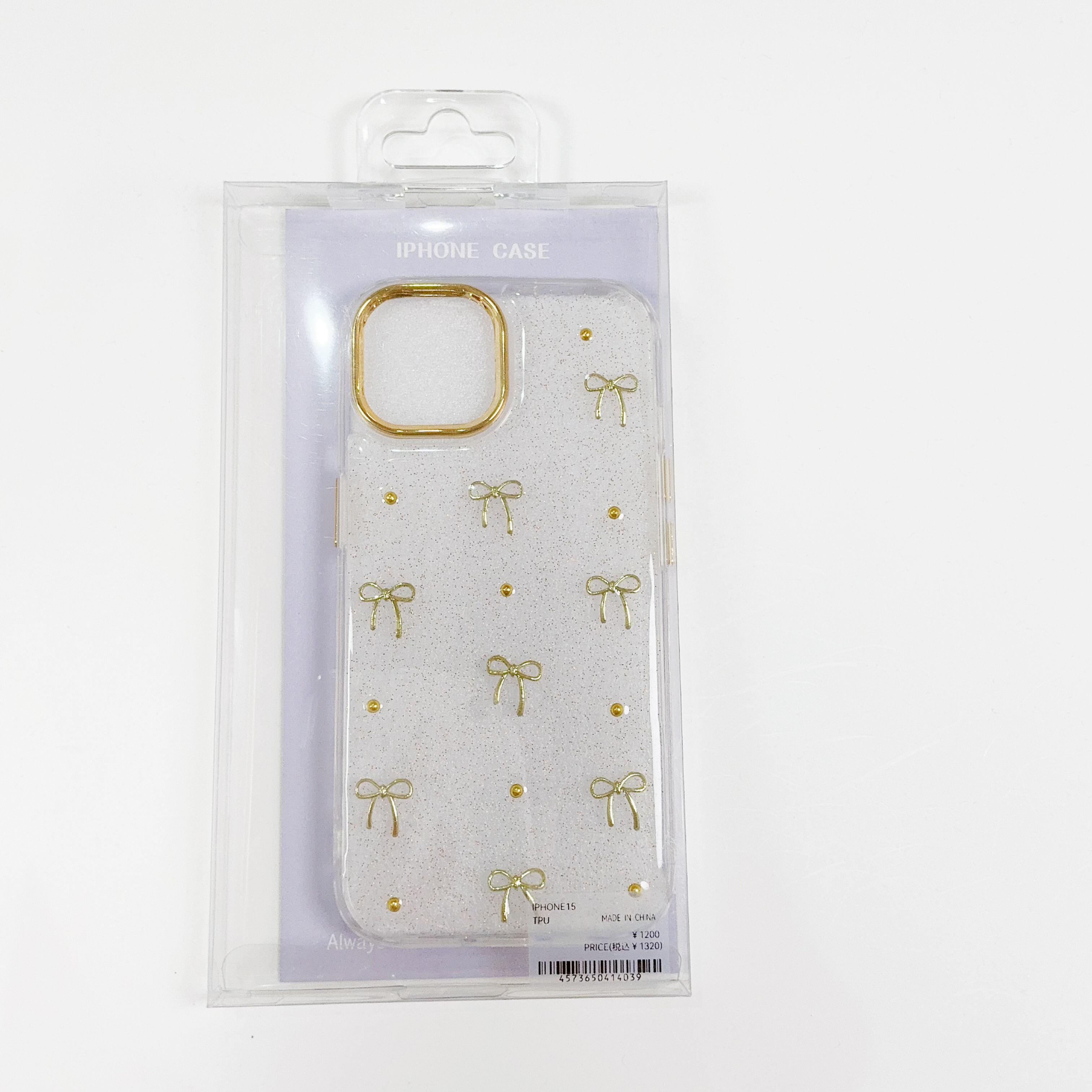 iPhone15ゴールドリボンとビジュー付きスマホケース