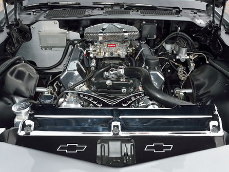 Technician inspecting and repairing a vehicle’s radiator and cooling system to prevent overheating and engine damage at 4G’s Tire & Auto Repair.