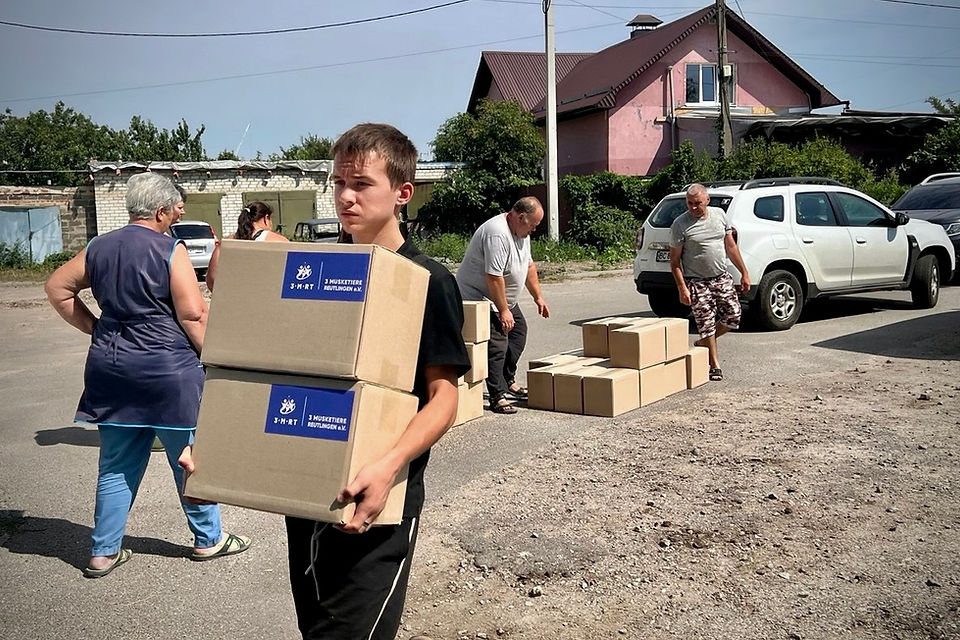 Verteilung von Hilfsgüter an Waisenkinder in der Ukraine