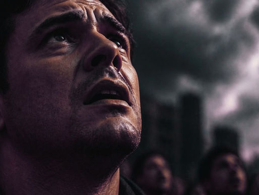 Close-up of a modern person looking upward with fear and confusion, dramatic lighting