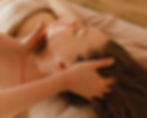 Therapist performing an energy healing massage at Zenvida wellness center in Madrid