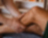 Two hands performing a foot reflexology massage on a client at Zenvida wellness center in Madrid
