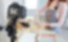 Camera on tripod recording a person baking in a kitchen