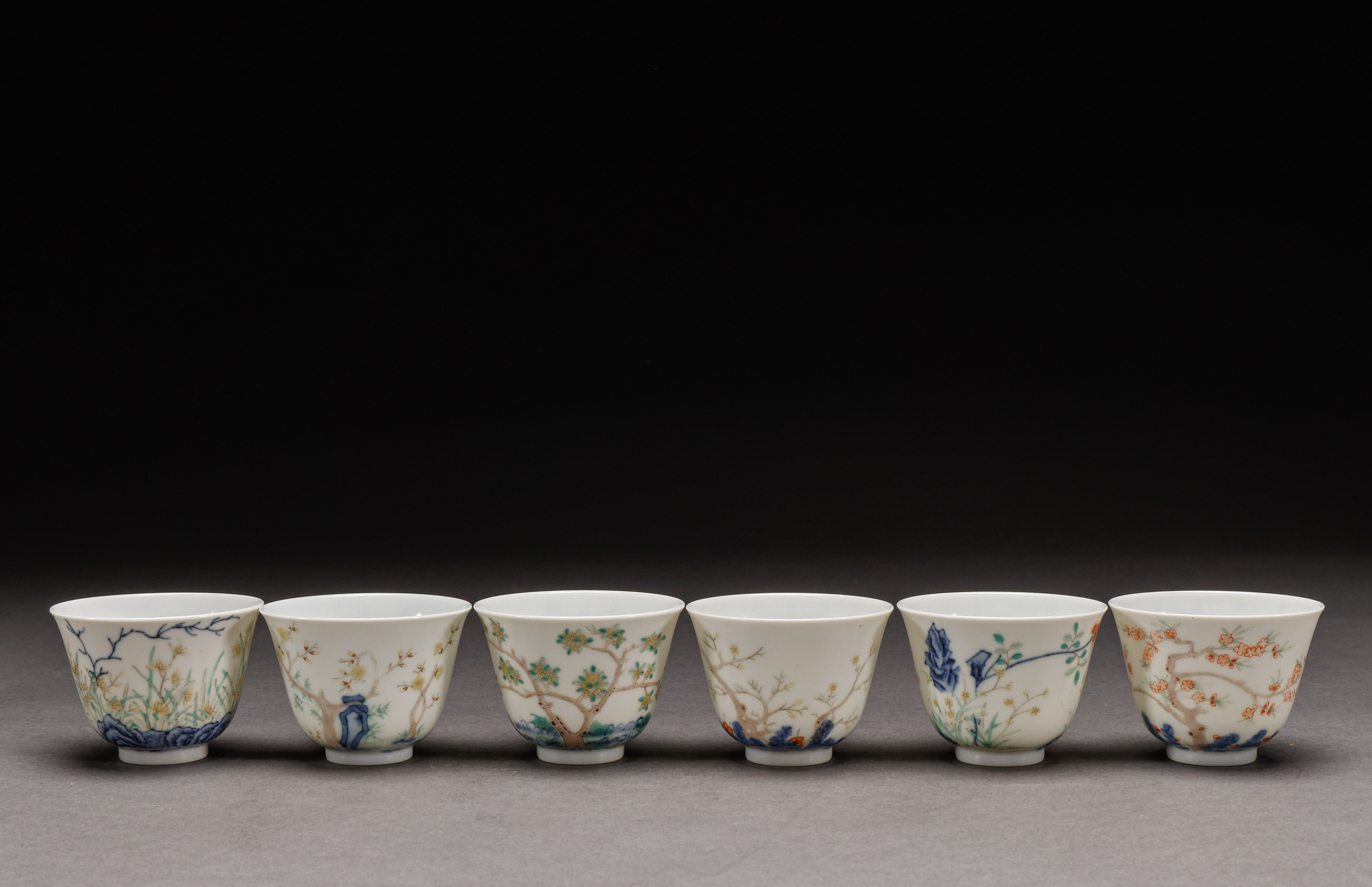 Set of Twelve Famille Rose “Flower Deity” Cups, Qing Style