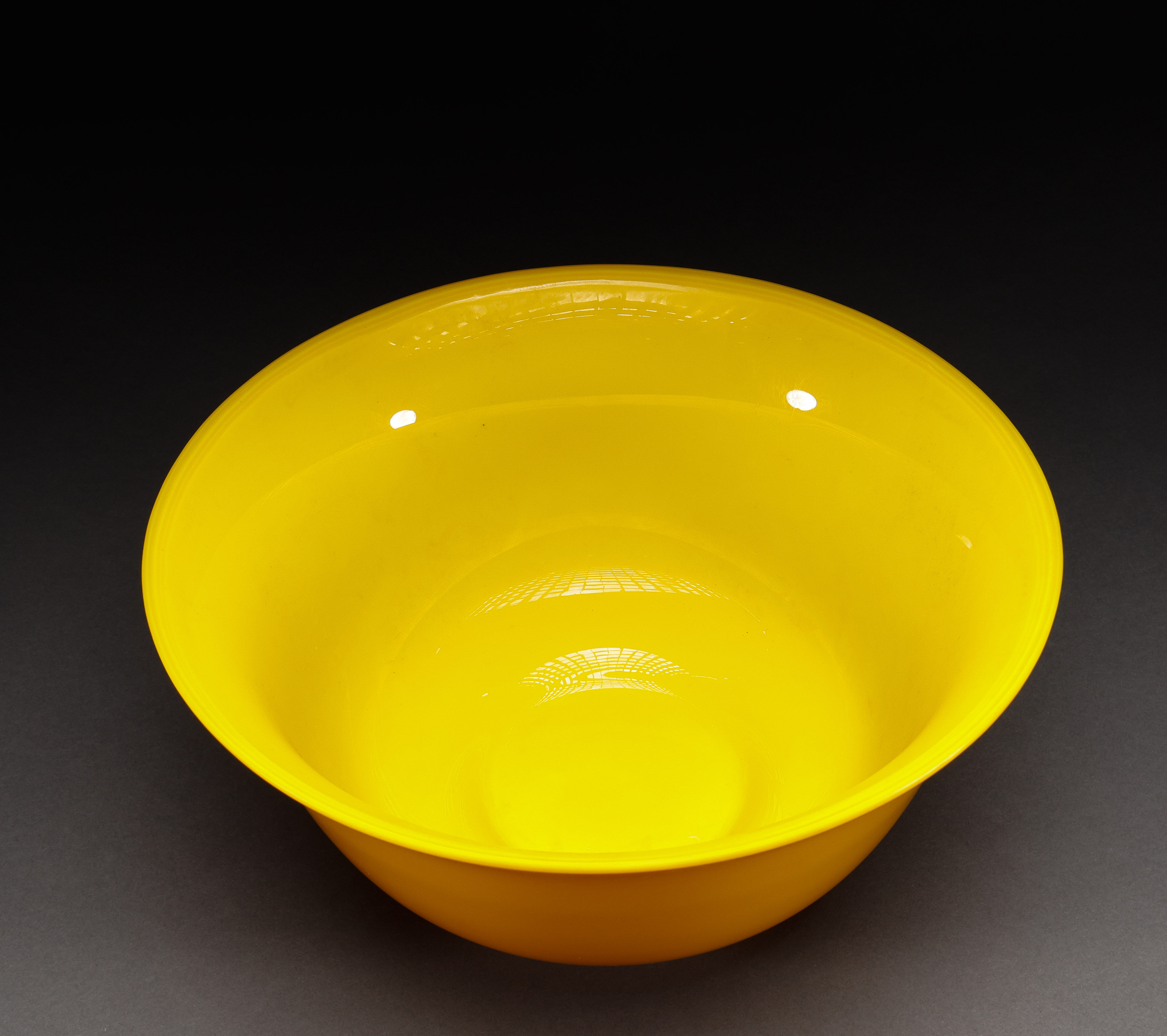 A Yellow Glazed Glass Bowl
