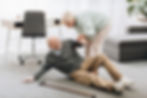 Elderly man fell on floor-being helped
