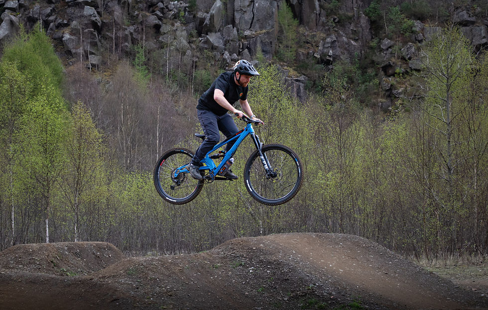 What are the benefits of electric mountain bikes in Scotland?