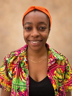 Kasiku’s warm professional studio portrait.png
