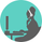 Silhouette of virtual assistant wearing a headset, sat her computer at a desk, typing.