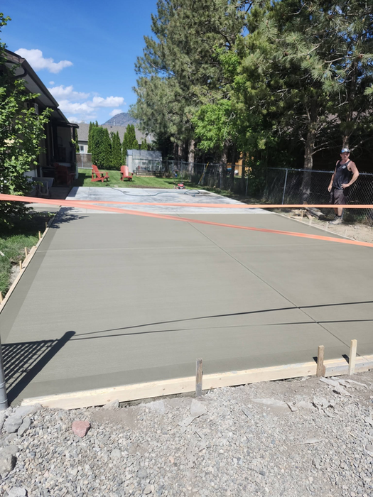 Residential concrete sidewalk installed by ScheerStone Concrete.