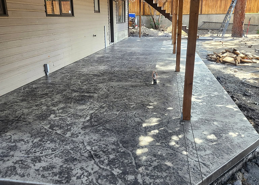 Residential concrete contractor completing a new project.