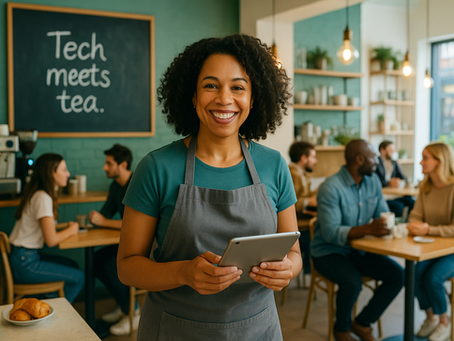 A cheerful female café owner with curly hair stands at the counter of a modern London coffee shop, holding an iPad and smiling, with a chalkboard reading “Tech meets tea” and a lively café full of customers in the background.