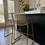 Thumbnail: CB2 Alpha Brass Metal Counter Stools
