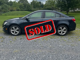 Dark used car sedan, now sold.