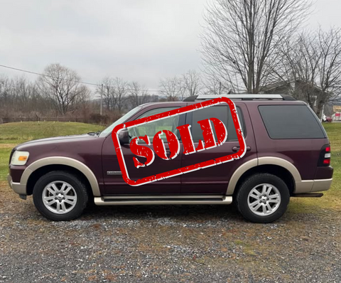 Sold used maroon SUV