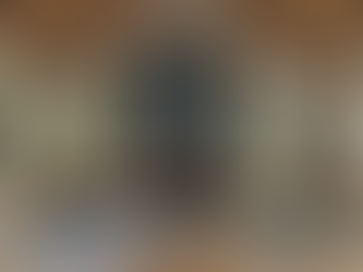 A tranquil yoga studio featuring art that promotes focus and serenity.