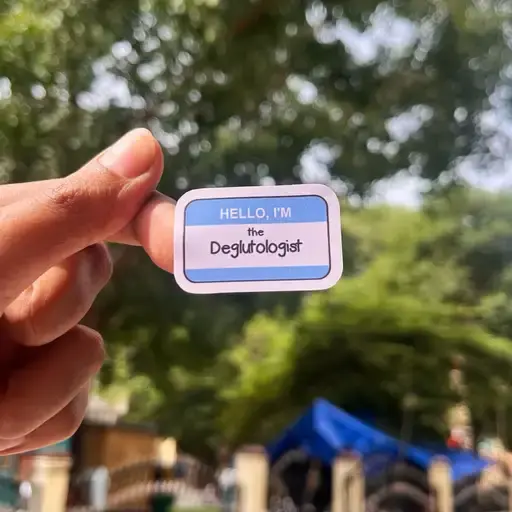 Hand holding "Hello, I'm the Overthinker" sticker
