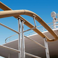 Luxury yacht deck with polished teak and chrome railings